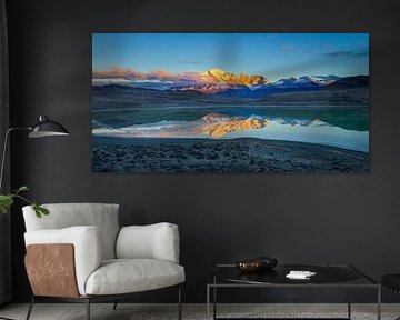 Sunrise over the snow-capped mountains of Torres del Paine by Chris Stenger