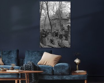 Black and white photo of the Jewish cemetery in Prague, Czech Republic, as it snows by Claudia Luijten