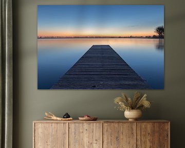 Jetty in Dirkshorn lake during blue hour by Bram Lubbers