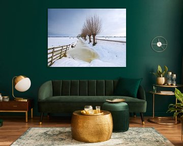 Sneeuw bedekt het polderlandschap bij Noordeloos in de winter