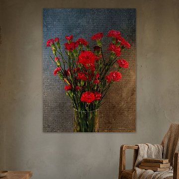 Rode rozen in glazen vaas