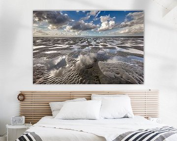 Rottumeroog. Clouds reflected in the water.