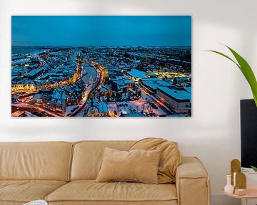 Illuminated ships in a snowy Lemmer in Friesland by Eye on You