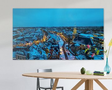 Snow and evening light at Lemmer harbour in Friesland by Eye on You