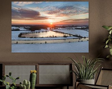Vecht river flowing through a snowy winter landscape during suns by Sjoerd van der Wal Photography