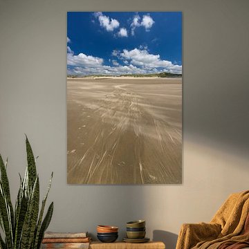 Sunny day on the Dutch coast with strong winds.