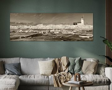 Netherlands, Marken, Creeping ice in front of lighthouse.