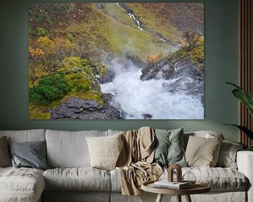 Dynamic waterfall in a rocky autumn landscape with gushing water. by Martin Köbsch