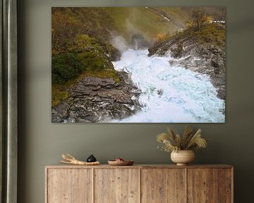 Dynamic waterfall in a rocky autumn landscape with gushing water. by Martin Köbsch