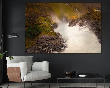 Dynamic waterfall in a rocky autumn landscape with gushing water. by Martin Köbsch