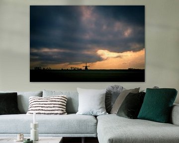 Mühle bei Sonnenuntergang in Groot-Schermer