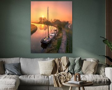 Sunrise in Friesland - Boat along a Misty Canal by Ewold Kooistra