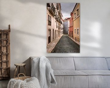 Quiet alley in Alfama - azulejos and cobblestones in Lisbon by Rolf Schnepp