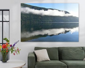 A mist over the lake on a summer morning by Claude Laprise