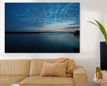 from the harbour in Zingst, the view of the Bodden with a burning sky by Martin Köbsch