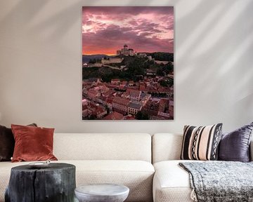Trencin Castle above the town at sunset by Ewold Kooistra