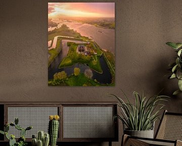 Loevestein Castle at sunset by Ewold Kooistra