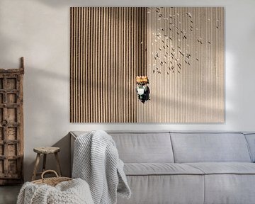 Tractor cultivating the soil seen from above