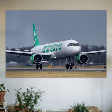 Transavia Airbus A321 landing on the polder runway. by Arthur Bruinen