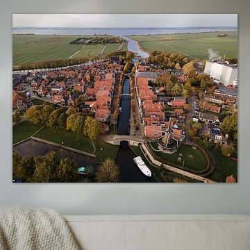 Aerial photograph of Sloten with windmill and canal in Friesland by Ewold Kooistra