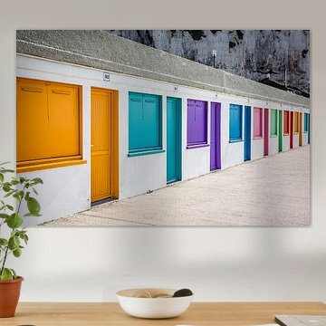 Colourful beach cabins in Étretat, Normandy coast