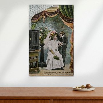 Historical postcard from 1904 in a photography studio