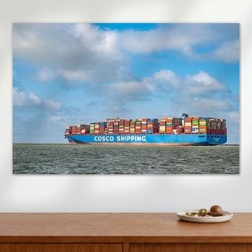 Container ship of COSCO SHIPPING leaving the port of Rotterdam