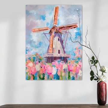A colourful windmill amongst tulips
