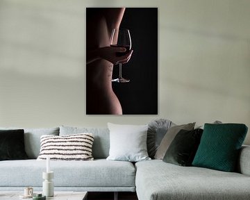 Woman body lines with a glas of wine