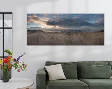 Panorama zonsondergang nederlands strand
