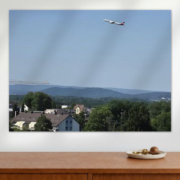 Swiss passenger aircraft climbing by Hermann Müller