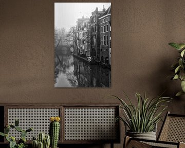 Grachtenpanden langs de Oudegracht met in de verte de Gaardbrug in de mist by De Utrechtse Grachten