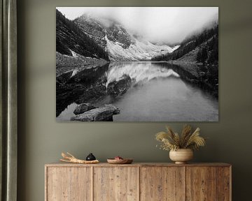 Lake between misty mountains by Anouk Noordhuizen