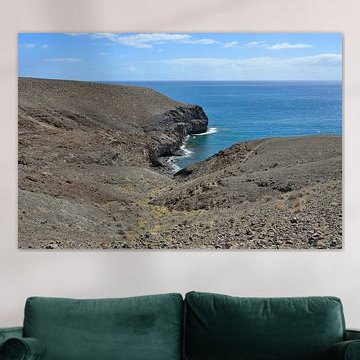 The volcanic landscape of Fuerteventura with its barren cliffs on the Atlantic coast by Tomherkules