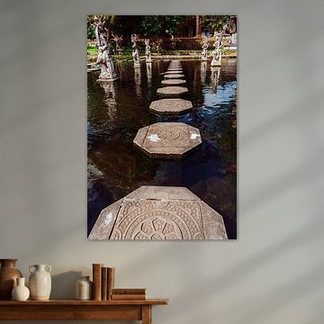 Stepping stones through the pond at Tirta Gangga by Marald Bes