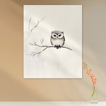 A small owl on a gnarled branch