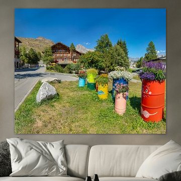 The Schweizerhaus, a chalet-style hotel built entirely of wood, with colourful, cheerful flower boxe