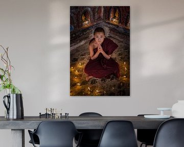 Praying monk at monastery in Nyaung Shwe near Inle in Myanmar by Wout Kok