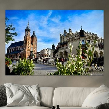 Horse-drawn carriages on Kraków’s historic Main Market Square by Dieter Stahl