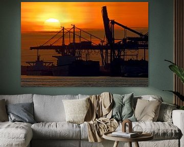 Sunset in the port of Rotterdam by Anton de Zeeuw