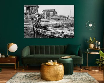 Girl operates the ferry on the river in Mandalay. At various places in Mandelay should make use of t by Wout Kok