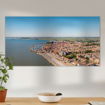 Rode daken en de oude haven van Volendam van Thomas Röell