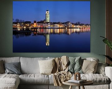 Skyline of Deventer on the river IJssel in the evening by Merijn van der Vliet