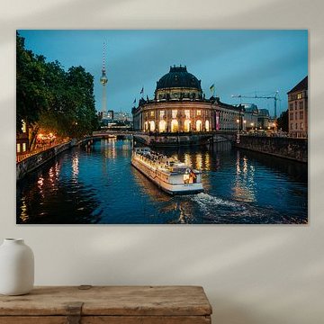 Berlin by night – a boat in front of the Bode Museum