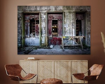 The three red doors in an abandoned factory by Steven Dijkshoorn