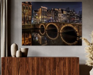 Amsterdam canal at night. by Mario Calma