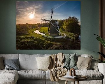 Windmolen met zon van Hans Langenberg