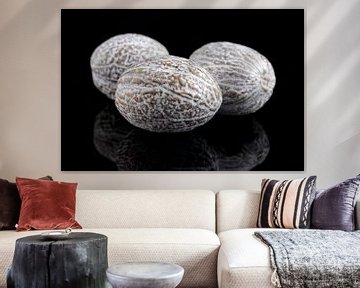 Nutmeg isolated on a black background by Sjoerd van der Wal Photography