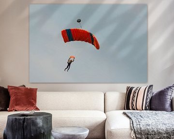 Parachutist tegen een blauwe lucht aan een blauw-oranje parachute van Tonko Oosterink