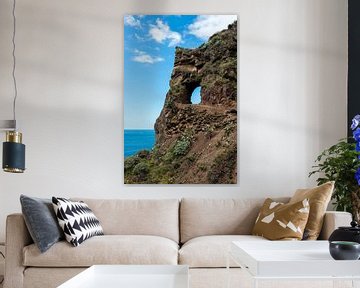 rocks with hole with blue sky view